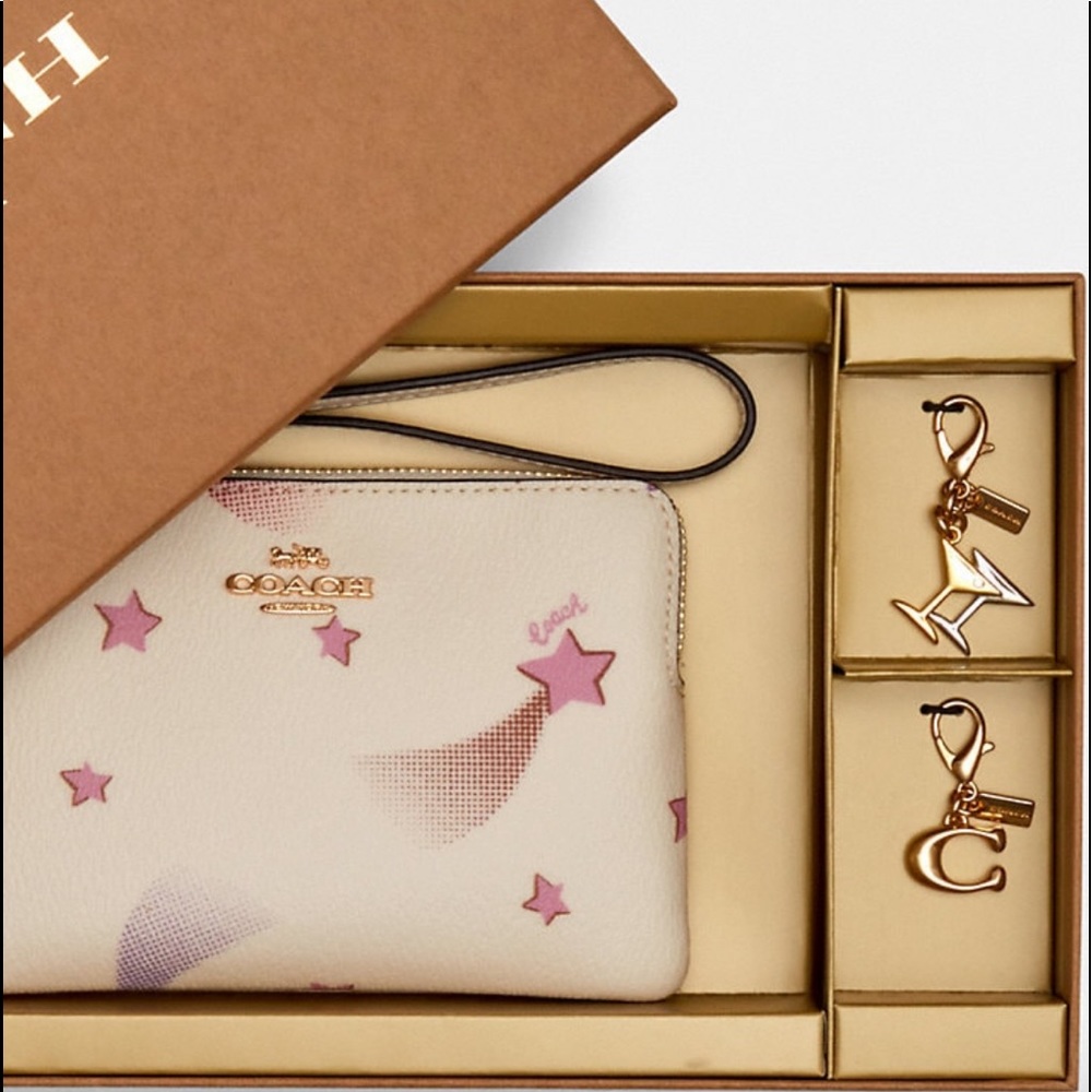 Coach wristlet and charms, BOXED, NWT
